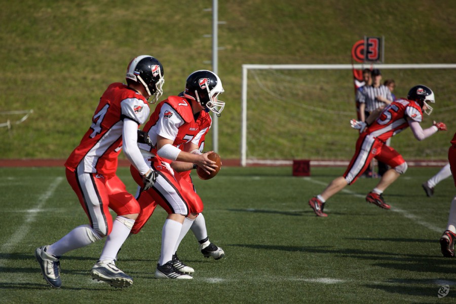 Rebels QB Dmitry Barshev (#7) during the snap