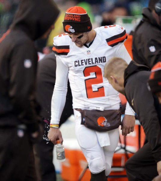 Cleveland Browns quarterback Johnny Manziel stands on the sidelines late in the second half of an NFL football game against the Seattle Seahawks, Sunday, Dec. 20, 2015, in Seattle. The Seahawks won 30-13. (AP Photo/Scott Eklund)