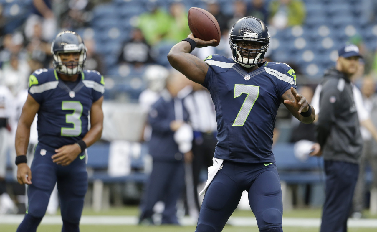 raiders-seahawks-football-tarvaris-jackson-russell-wilson_pg_600