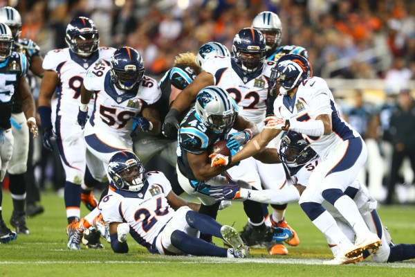 Feb 7, 2016; Santa Clara, CA, USA; Carolina Panthers running back Fozzy Whittaker (43) is tackled by members of the Denver Broncos defense in the third quarter in Super Bowl 50 at Levi's Stadium. Mandatory Credit: Mark J. Rebilas-USA TODAY Sports ORG XMIT: USATSI-245820 ORIG FILE ID: 20160207_jla_su5_243.jpg