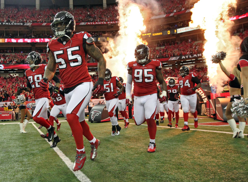 011313 ATLANTA : The Falcons defense led by John Abraham takes the field to play the Seahawks in their NFL divisional playoff game at the Georgia Dome in Atlanta on Sunday, Jan. 13, 2013. CURTIS COMPTON / CCOMPTON@AJC.COM