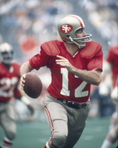 SAN FRANCISCO, CA - CIRCA 1970's: John Brodie #12 of San Franicisco 49ers, scramble against the Philadelphia Eagles during a early circa 1970's NFL football game at Candlestick Park in San Franicisco, California. Brode played for the 49ers from 1957-73. (Photo by Focus on Sport/Getty Images)