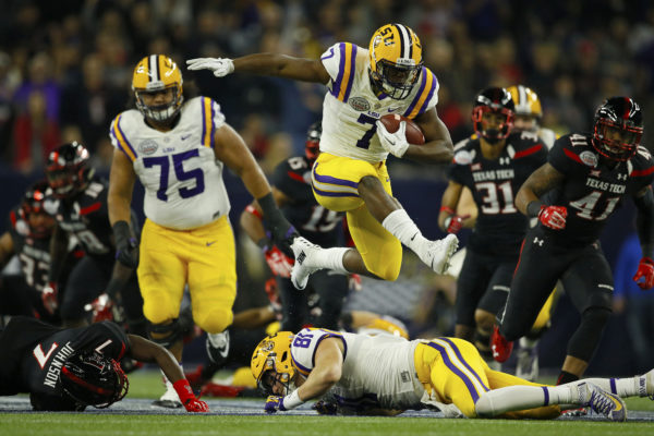 Louisiana State University Tigers running back Leonard Fournette (7) runs for a gain during the Texas Bowl NCAA college football game against Texas Tech University Red Raiders on Tuesday Dec. 29, 2015, in Houston. (Aaron M. Sprecher via AP)