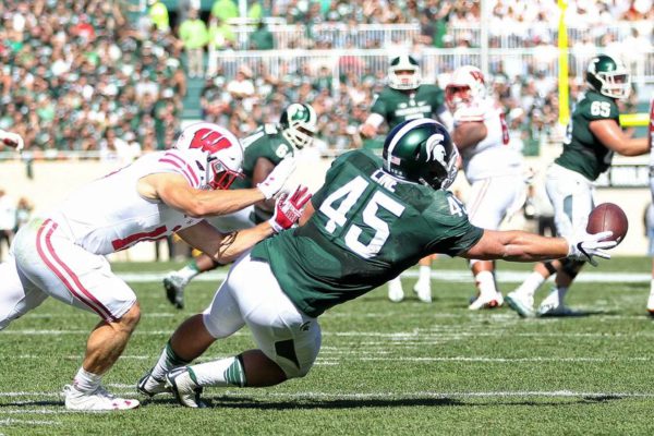 ncaa-football-wisconsin-michigan-state-839x560