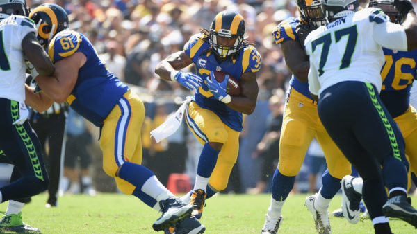LOS ANGELES, CA - SEPTEMBER 18: Todd Gurley #30 of the Los Angeles Rams cuts throughthe hole during the second quarter of the home opening NFL game against the Seattle Seahawks at Los Angeles Coliseum on September 18, 2016 in Los Angeles, California. (Photo by Harry How/Getty Images)