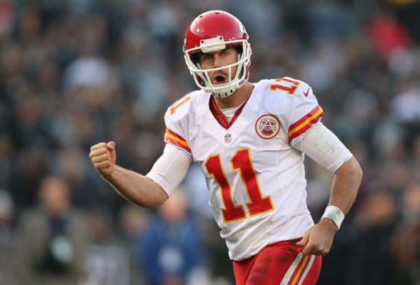 OAKLAND, CA - DECEMBER 15: Alex Smith #11 of the Kansas City Chiefs celebrates after a touchdown against the Oakland Raiders at O.co Coliseum on December 15, 2013 in Oakland, California. (Photo by Jed Jacobsohn/Getty Images)