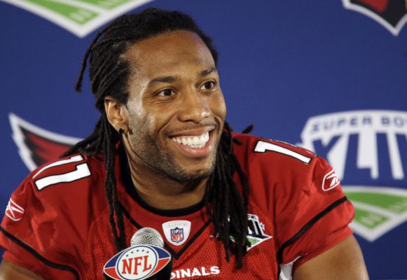 Arizona Cardinals' Larry Fitzgerald smiles as he speaks at a morning news conference at the team hotel Thursday, Jan. 29, 2009, in Tampa, Fla. The Cardinals will face the Pittsburgh Steelers in Super Bowl XLIII in Tampa, on Sunday. (AP Photo/Ross D. Franklin)